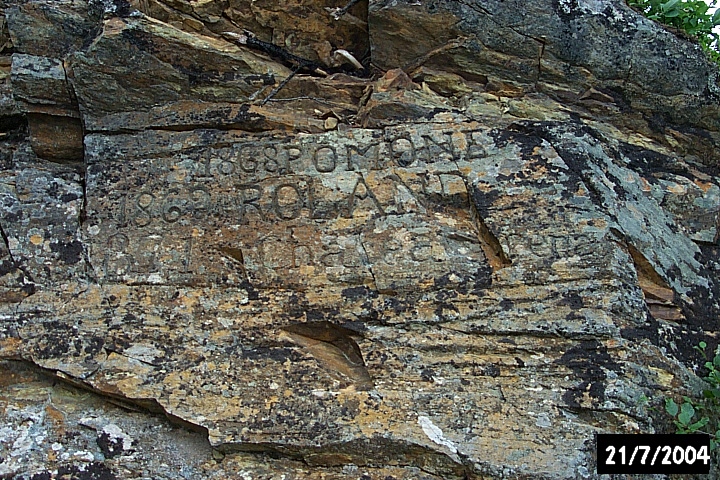 Inscriptions on the rockface: '1868POMONE / 1862 ROLAND / 1871 Chatea... rena' -- ships and their visits to Croque.